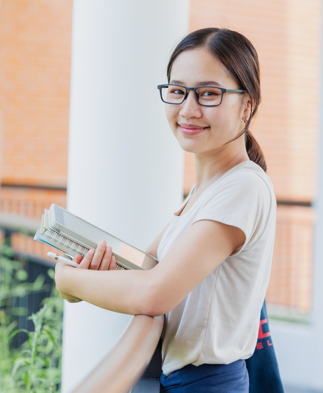 portrait university asian teen girl using tablet modern learning education lifestyle e1748798403450